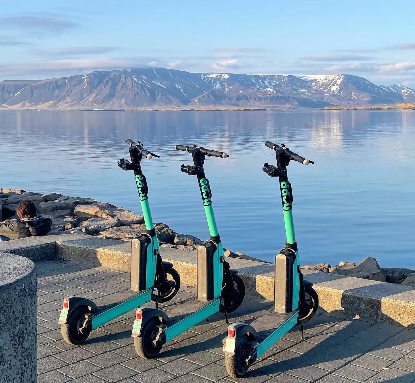 Hopp scooters in front of Mount Esja in Reykjavík
