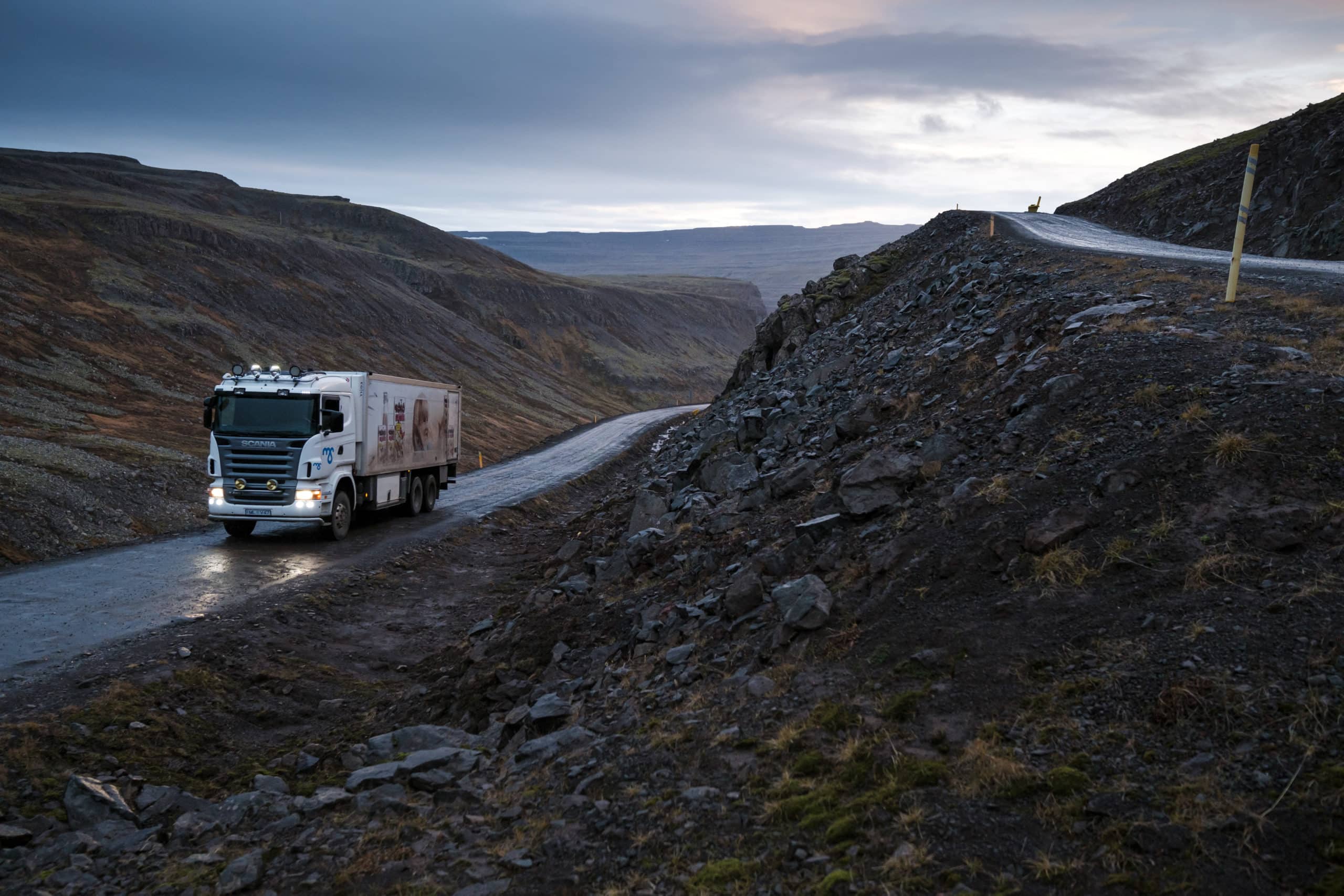 The local milk truck drving across the winding roads of the Westfjords