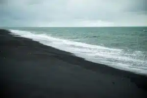 why is the sand black in iceland